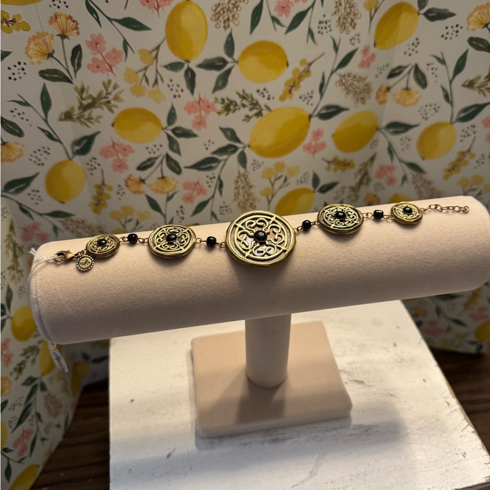 Elegant Gold and Black Bracelet